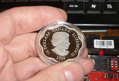 reverse of silver horse coin 15 CAD canada lotus